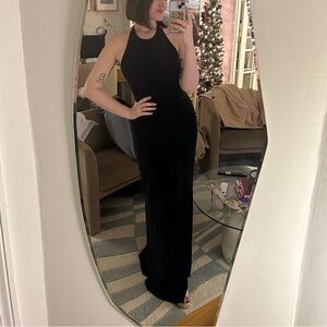 Black floor length gown with slit